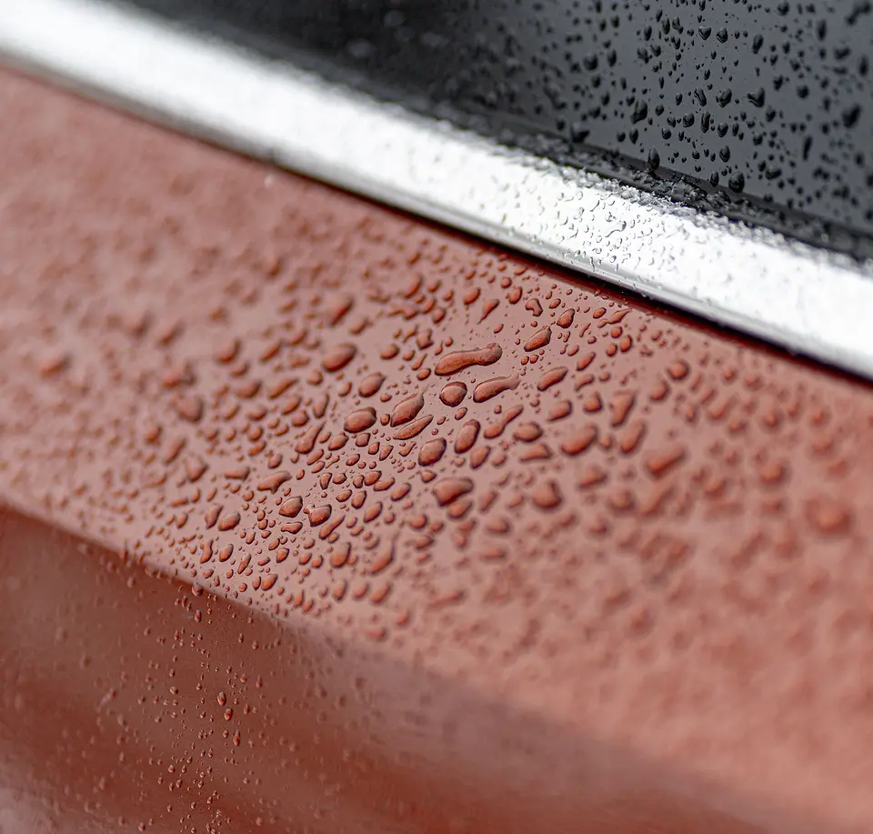 Water beading on protected red paint