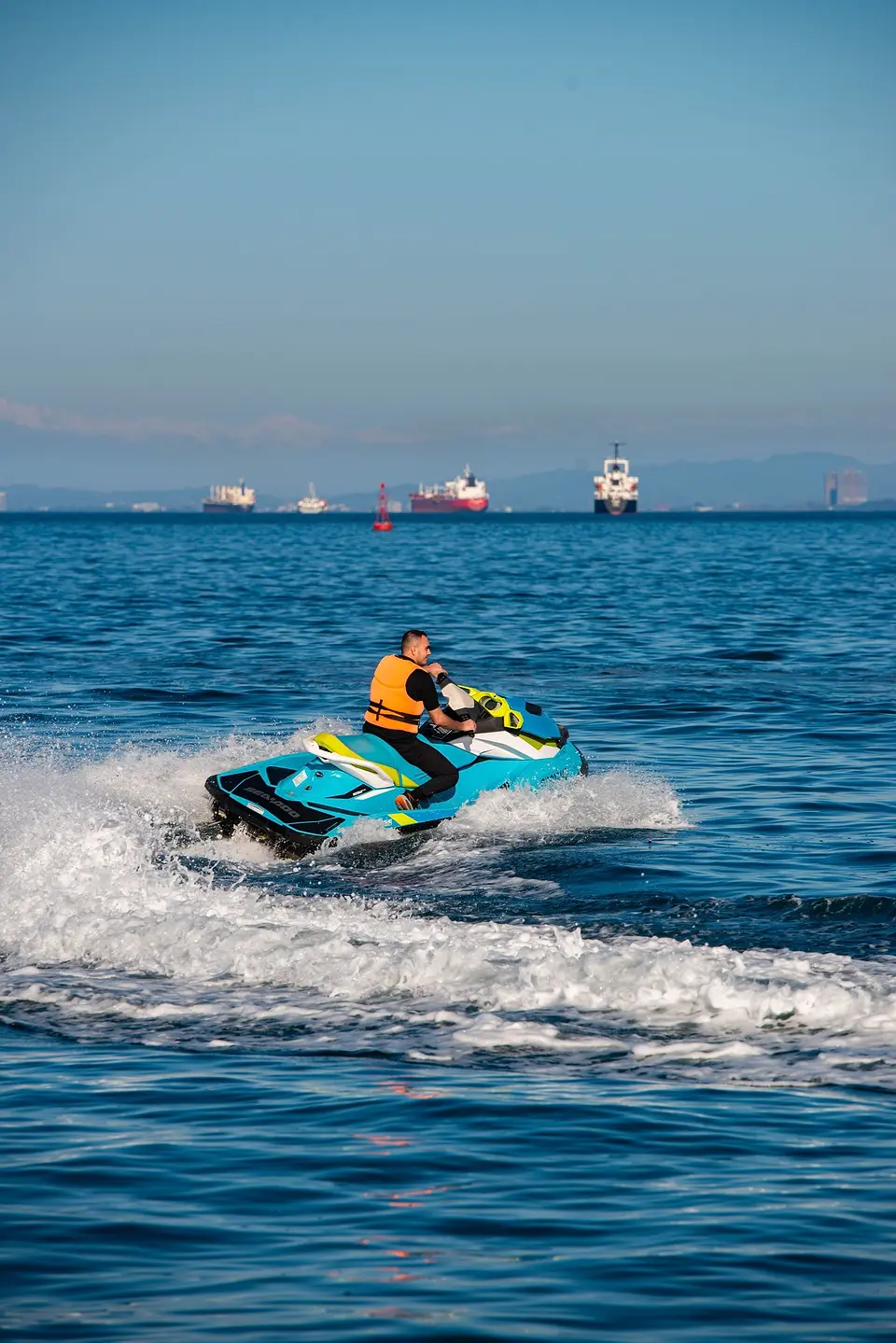 Jet ski cutting through blue water