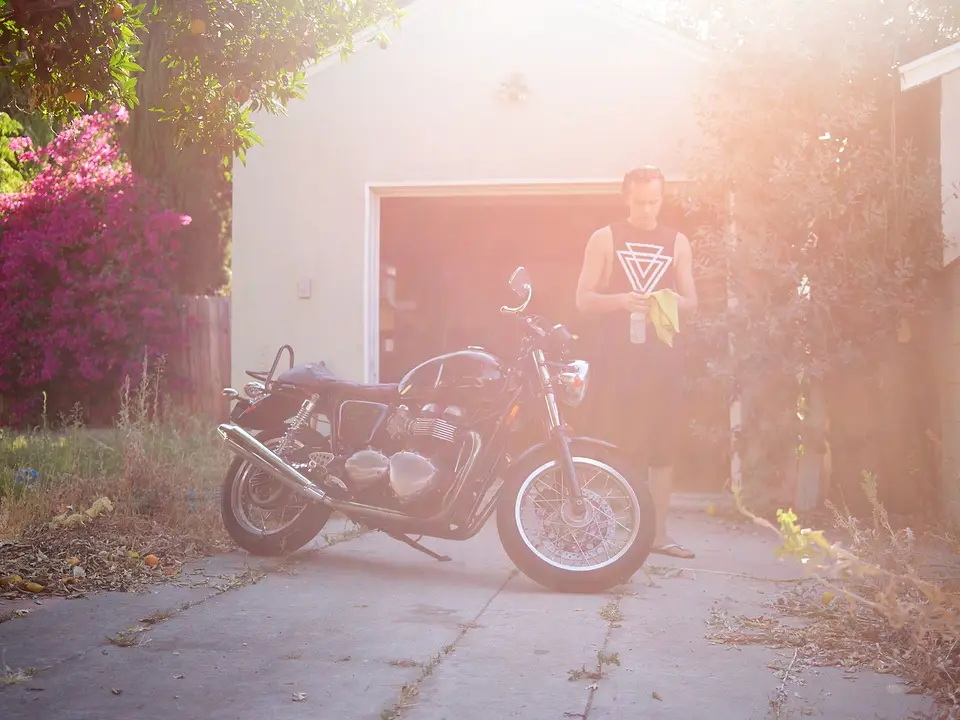 Motorcycle parked in a home driveway