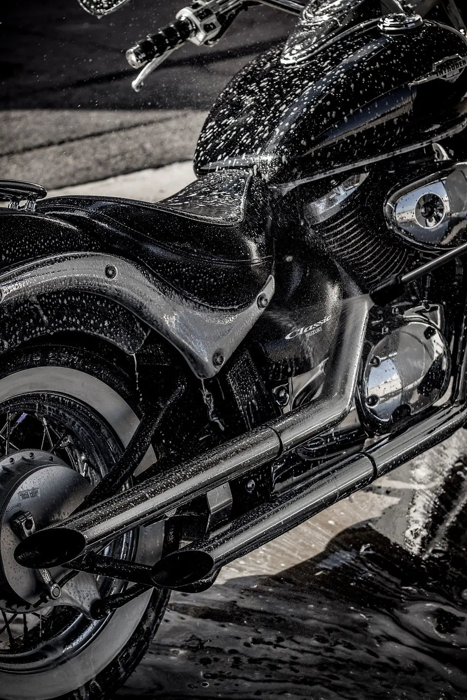 Wet chrome and paint on a cruiser motorcycle