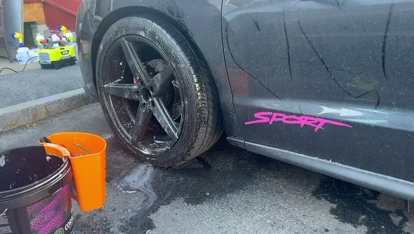 Wash buckets ready next to the car on the job